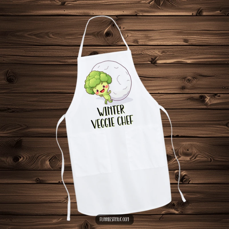 Funny apron illustration of a hopeful broccoli floret character pushing a giant snowball uphill, perfect for kitchen battles.