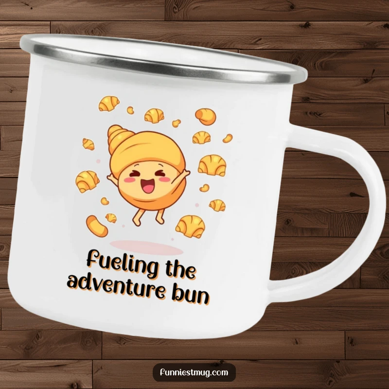 Funny camping mug with a croissant character performing a cartwheel, butter croissants flying, designed for durability and humor during outdoor excursions.