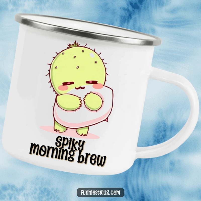 Funny Kawaii enamel camping mug with a cactus character wincing as it hugs a fluffy pillow.