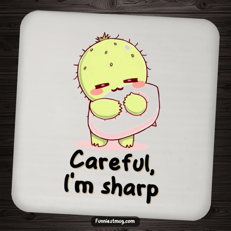 Funny Kawaii drink coaster with a cactus character wincing as it hugs a fluffy pillow.