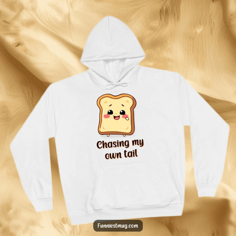Funny toast slice character attempting to bite its crust on a soft hoodie, providing cozy comfort with a side of funny absurdity.