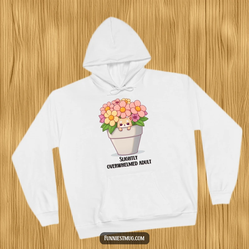 Warm and fuzzy funny hoodie design with a curious creature peeking from a large teacup, great for lounging.