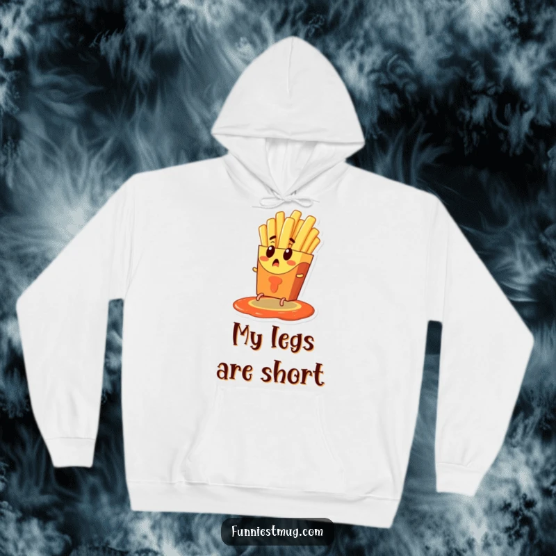 Funny hoodie depicting a surprised french fry character with tiny legs desperately escaping a ketchup pool, offering cozy and humorous food-themed comfort.