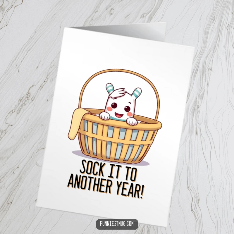 Funny Free Printable Birthday Card: Cheeky sock puppet peeking out of an empty laundry basket, plotting mischief.