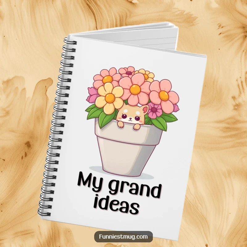 Funny notebook with a creature peeking from a teacup on the cover, ideal for recording ideas.