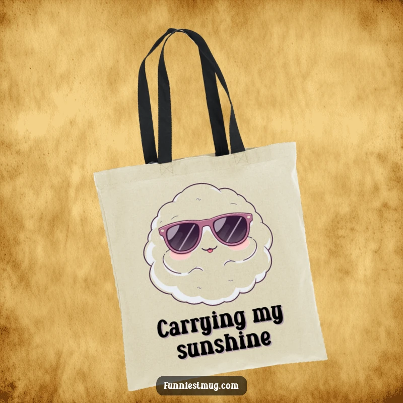 Funny tote bag featuring a cute, fluffy cloud character comically wearing oversized sunglasses, perfect for carrying essentials in style.